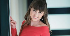 Riley Reid discussing her AI platform Clona, which enables creators to build interactive digital personas.