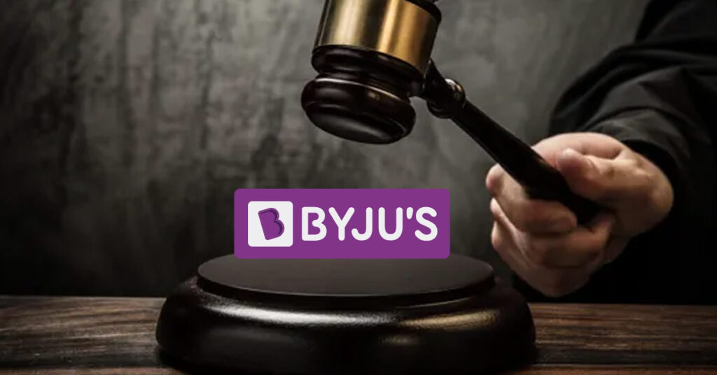 Background image showing a gavel in judge's hand with Byju's logo overlay