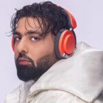 Indian singer, rapper, musician Badshah wearing Dyson OnTrac headphones