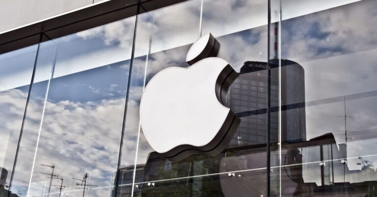 Apple logo on a glass building