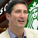 A picture of Starbucks CEO Brian Niccol with a background image of a Starbucks outlet shopfront