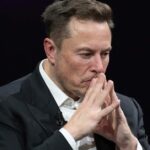 Elon Musk sad expression