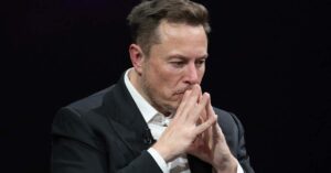 Elon Musk sad expression