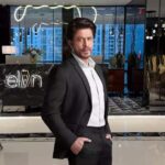 Bollywood Superstar Shahrukh khan standing in Elan Group's premises