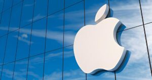A cute Apple logo on a glass building