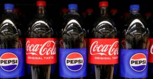 Pepsi and Coca-Cola bottles pictured together