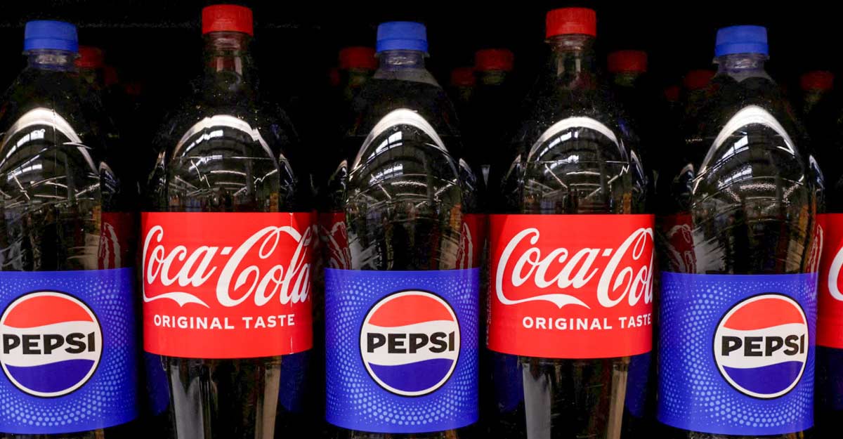 Pepsi and Coca-Cola bottles pictured together