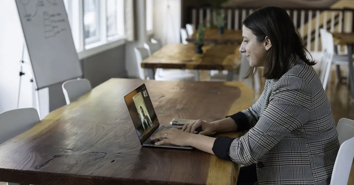 A woman taking interview online.