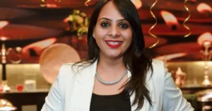 Ayesha Shaik smiling during a professional photoshoot, representing her role as the UAE’s first phonics teacher and literacy advocate.