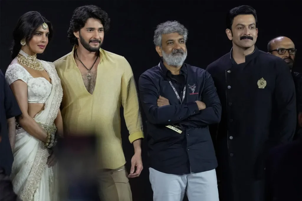 (L-R) Actress Priyanka Chopra Jonas, Telugu superstar Mahesh Babu, Filmmaker S.S. Rajamouli, and actor Prithviraj Sukumaran - Unveiling the first look of film “Varanasi” at Ramoji Film City, Hyderabad, India, on Saturday, November 15, 2025. (AP Photo)