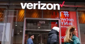 Verizon corporate headquarters building with company logo in the United States, representing job cuts and corporate restructuring news.