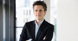 Aaron Levie, CEO of Box, discussing how AI efficiency may expand knowledge work rather than replace jobs