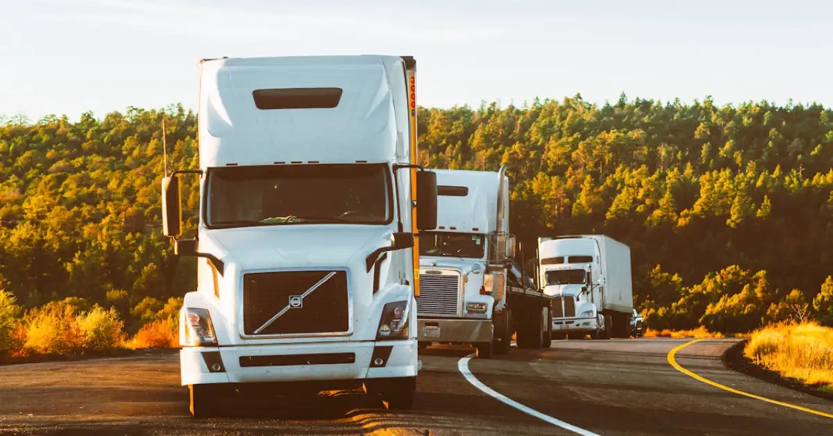 Semi-truck traveling on an open highway, representing the mobility infrastructure that supports emerging startups.