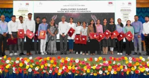 Magic Bus representatives with youth participants at their Employers Summit