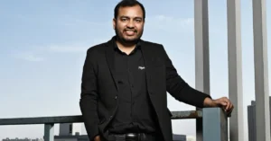 PhysicsWallah acquisition government exam platform - Alakh Pandey, founder of PhysicsWallah, during a public appearance as the company explores acquiring a stake in a government exam preparation platform