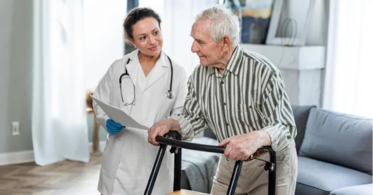 Female doctor consulting with an elderly male patient during a geriatric diagnosis and evaluation session