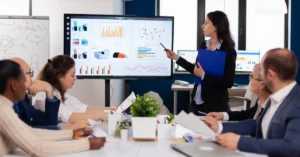 Employees participating in a corporate training session in a modern workplace