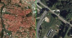 High-resolution satellite imagery of Earth's surface showing detailed terrain and urban areas from orbit