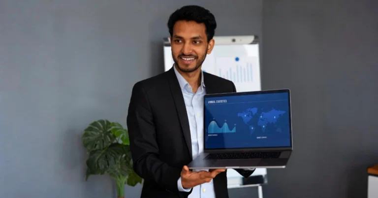 Indian founder reviewing omnichannel sales data across marketplace and D2C platforms on a laptop