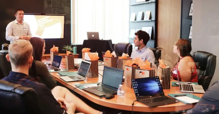 A business professional reviewing tech strategy on a laptop, representing digital transformation and business growth in 2026