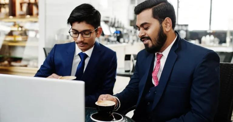 Indian business owners reviewing exit planning options with an M&A advisor