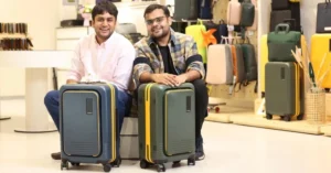 Mokobara co-founders Sangeet Agrawal and Navin Parwal with luggage products Caption: Sangeet Agrawal and Navin Parwal met at Urban Ladder before founding Mokobara. Description: Founder portrait anchoring the Series C funding story for Mokobara's luggage business.